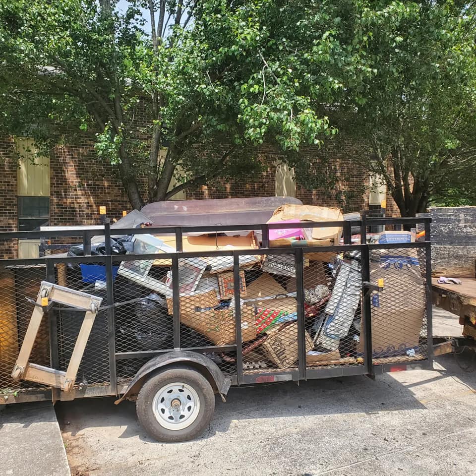 Trailer loaded with backyard debris after a Madison removal job Trailer loaded with backyard debris after a Madison removal job