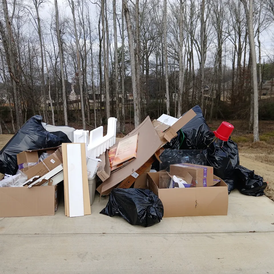Bags, boxes and debris piled for bulk trash pickup