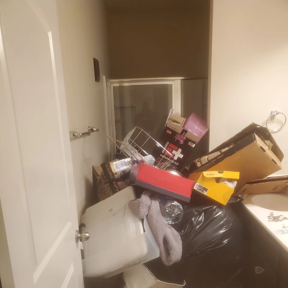 Cluttered room before a hoarder cleanout