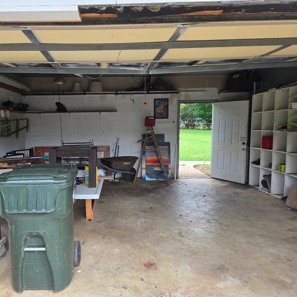 Garage with junk before a cleanout Garage with junk before a cleanout