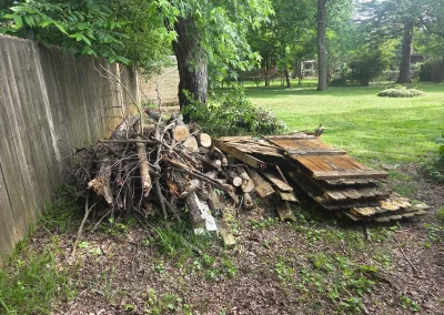 Brush and lumber pile for yard waste removal - Huntsville area junk removal
