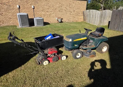 Old riding mower and push mowers for removal - Huntsville area junk removal
