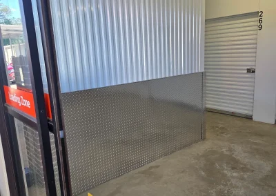 Storage unit with junk before cleanout - Huntsville area junk removal