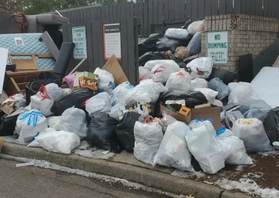 Large pile of trash bags for removal - Huntsville area junk removal