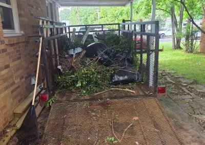 Trailer loaded with yard debris - Huntsville area junk removal