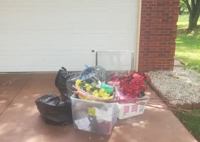 Garage with items before removal - Huntsville area junk removal