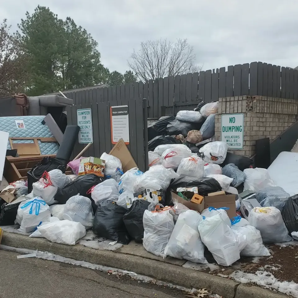 Large pile of trash bags ready for removal Large pile of trash bags ready for removal