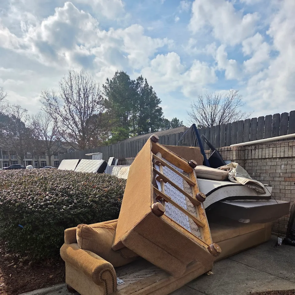 Old couch and furniture loaded for haul away